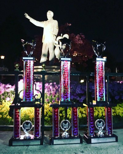 Lemoore High's award-winning choral groups rack up hardware at Disneyland A statue of Walt Disney oversees the trophies the Lemoore High School choir program earned Saturday at the Music in the Parks Festival.